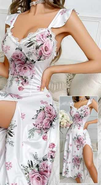 Dress made of floral Lycra, open on one side with metal shoulder