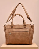 A women's bag made of leather with two zippers