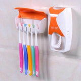 Automatic toothpaste and toothbrush holder