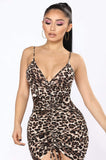 House Tiger dress made of Lycra with a ruffle tie at the front