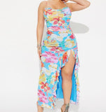 Long dress made of floral lycra with ruffles on one side