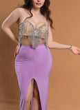 A belly dancing suit made of Lycra with shiny thread embroidery at the chest