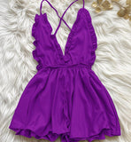 Jumpsuit made of satin with ruffles around the chest